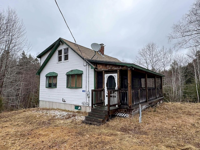 116 Sandy Beach Ln, Otis, ME 04605 - view of front of property featuring a chimney
