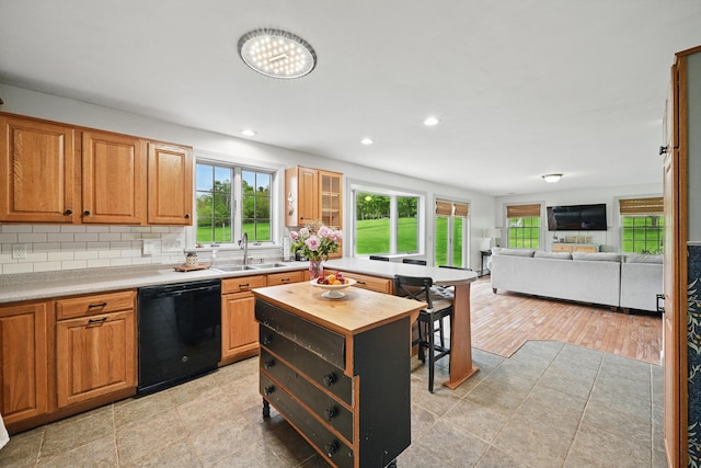 94 Staples Hill Rd, Canton, ME 04221 - kitchen featuring black dishwasher, a sink, butcher block countertops, healthy amount of natural light, and recessed lighting