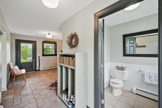 94 Staples Hill Rd, Canton, ME 04221 - bathroom with a baseboard heating unit, toilet, and wainscoting