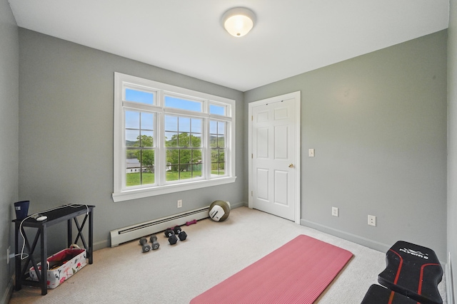 94 Staples Hill Rd, Canton, ME 04221 - workout area featuring a baseboard heating unit, carpet flooring, and baseboards