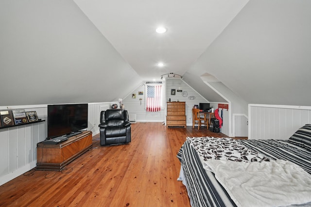 94 Staples Hill Rd, Canton, ME 04221 - bedroom with hardwood / wood-style floors, vaulted ceiling, and wooden walls