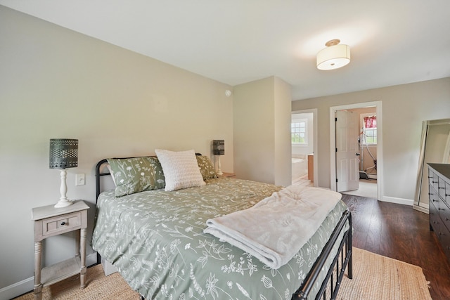 94 Staples Hill Rd, Canton, ME 04221 - bedroom with wood finished floors, baseboards, and ensuite bath