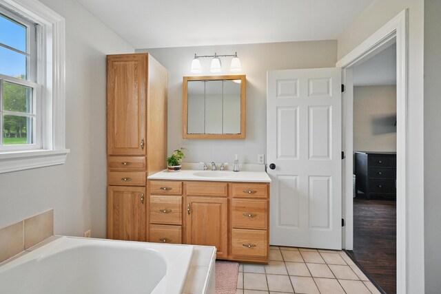 94 Staples Hill Rd, Canton, ME 04221 - bathroom featuring vanity, a bathtub, and tile patterned flooring
