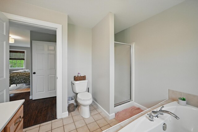 94 Staples Hill Rd, Canton, ME 04221 - full bathroom with a shower stall, a garden tub, toilet, ensuite bath, and vanity