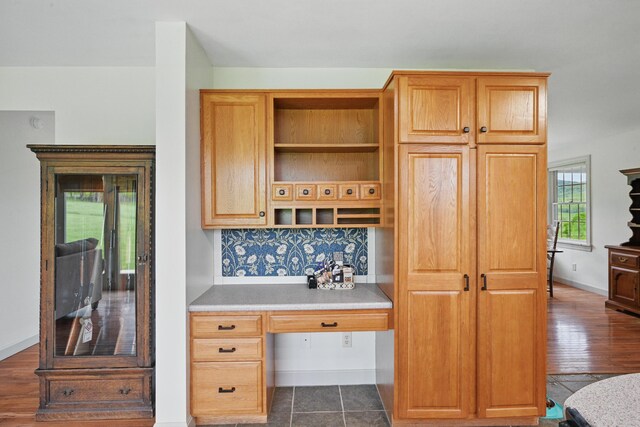 94 Staples Hill Rd, Canton, ME 04221 - kitchen featuring open shelves, decorative backsplash, light countertops, and baseboards