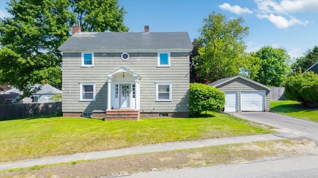 139 S Ave, Lewiston, ME 04240 - colonial inspired home featuring an outbuilding, a detached garage, and a chimney