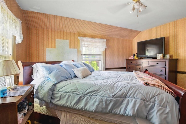 139 S Ave, Lewiston, ME 04240 - bedroom with wallpapered walls, lofted ceiling, and ceiling fan