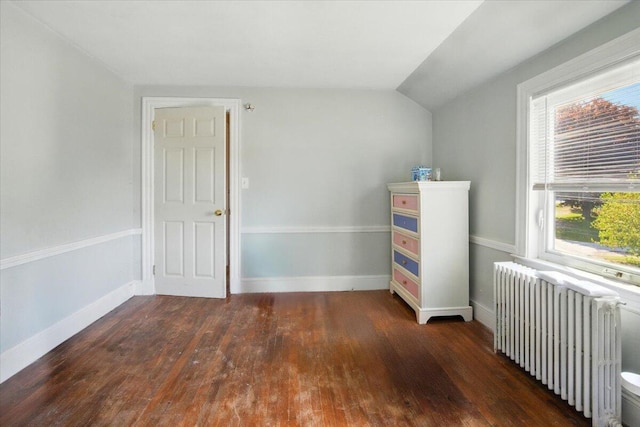 139 S Ave, Lewiston, ME 04240 - bonus room with radiator, wood finished floors, vaulted ceiling, and baseboards