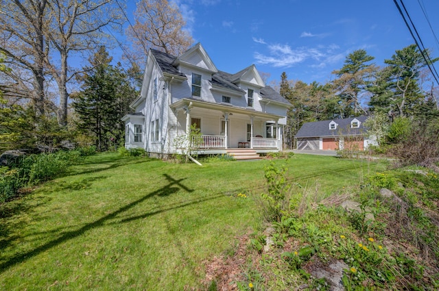 1283 State Route 129, South Bristol, ME 04568 - victorian home featuring a porch, a front lawn, and a garage