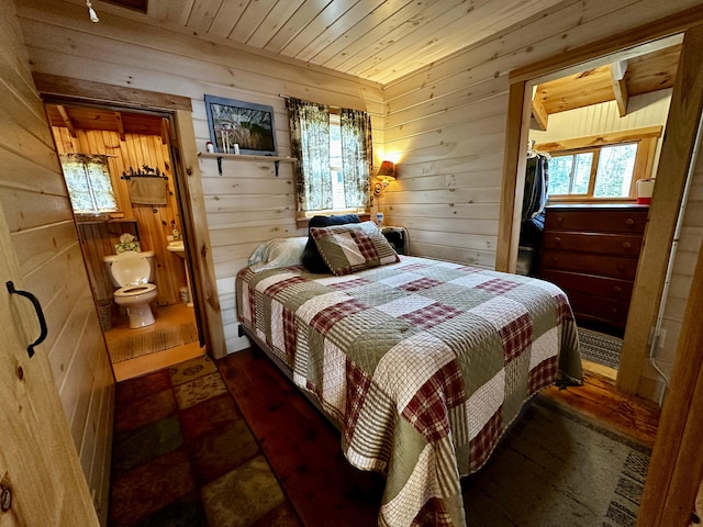1080 Frenchtown Rd, Frenchtown Twp, ME 04441 - bedroom with wooden walls, wood ceiling, hardwood / wood-style flooring, a spacious closet, and a closet