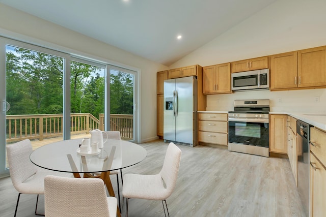 324 Gray Rd, Shapleigh, ME 04076 - kitchen with stainless steel appliances, light countertops, light wood finished floors, lofted ceiling, and recessed lighting