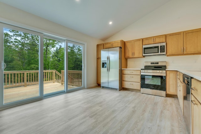 324 Gray Rd, Shapleigh, ME 04076 - kitchen featuring appliances with stainless steel finishes, light countertops, lofted ceiling, light wood-type flooring, and recessed lighting
