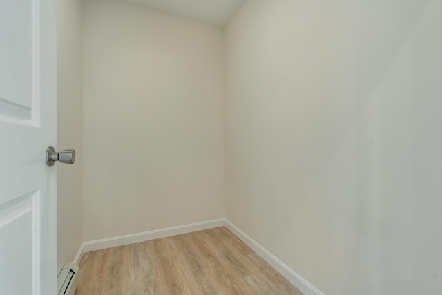 324 Gray Rd, Shapleigh, ME 04076 - empty room featuring a baseboard radiator, light wood-style flooring, and baseboards