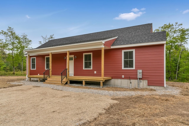 324 Gray Rd, Shapleigh, ME 04076 - view of front of home with a shingled roof and a porch