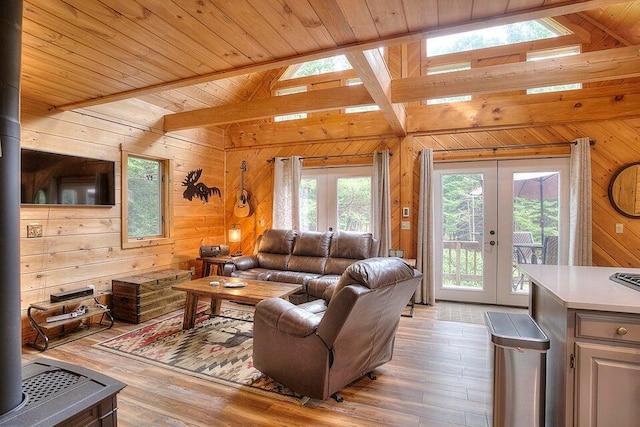 231 Kendall Farm Trl, Rangeley, ME 04970 - living room with french doors, wood walls, light wood finished floors, and wooden ceiling