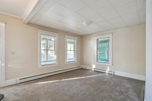 carpeted spare room with a baseboard radiator, healthy amount of natural light, and baseboards