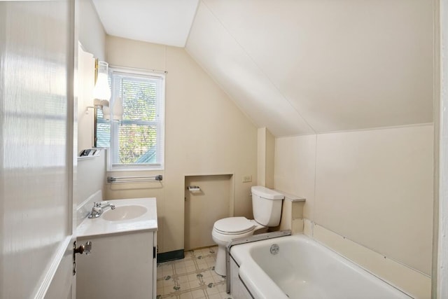 full bathroom with vaulted ceiling, toilet, vanity, a tub, and tile patterned floors
