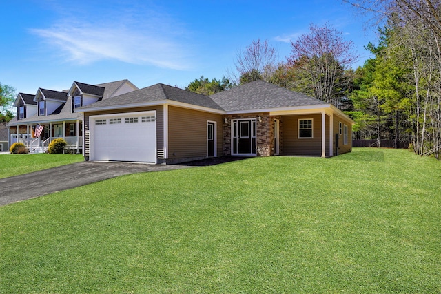 9 Country Dr, Old Orchard Beach, ME 04064 - view of front facade featuring a garage, driveway, and a shingled roof
