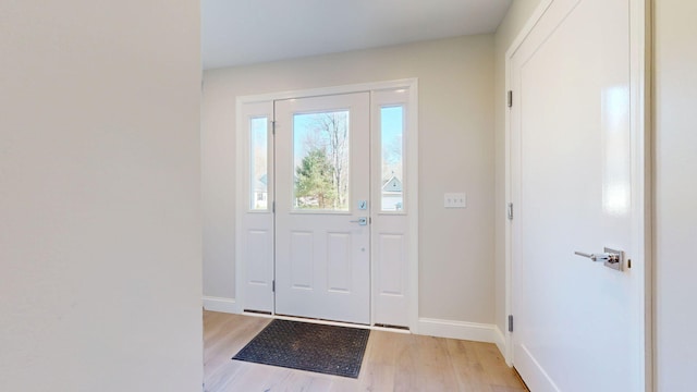 9 Country Dr, Old Orchard Beach, ME 04064 - foyer with light wood-style flooring and baseboards
