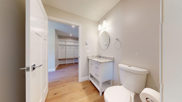 9 Country Dr, Old Orchard Beach, ME 04064 - bathroom with toilet, wood finished floors, vanity, recessed lighting, and baseboards