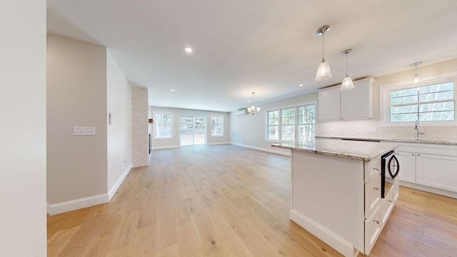 9 Country Dr, Old Orchard Beach, ME 04064 - kitchen with a sink, a chandelier, light wood-style floors, a center island, and recessed lighting