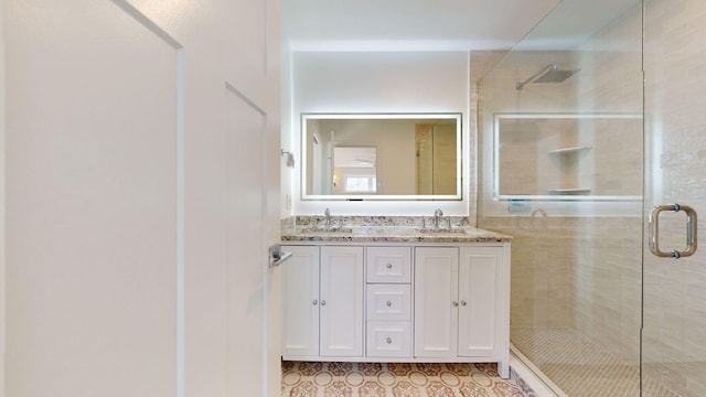 9 Country Dr, Old Orchard Beach, ME 04064 - full bathroom featuring a stall shower, double vanity, and tile patterned flooring