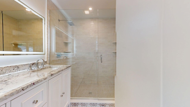 9 Country Dr, Old Orchard Beach, ME 04064 - bathroom featuring a shower stall, vanity, and recessed lighting
