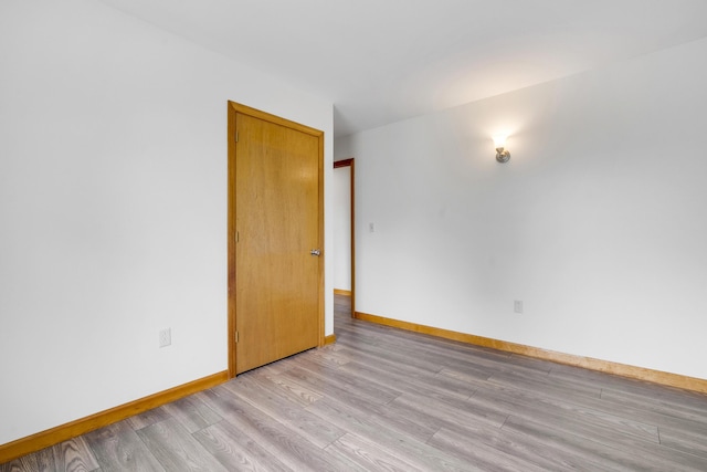 32 Thorne Ave, Lewiston, ME 04240 - unfurnished room featuring light wood-style floors and baseboards