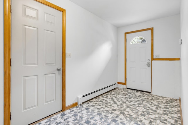 32 Thorne Ave, Lewiston, ME 04240 - foyer featuring a baseboard radiator, tile patterned floors, and baseboards