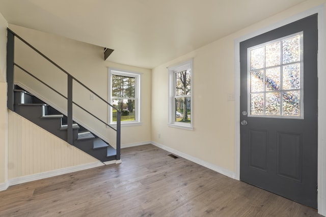 441 Middle Rd, Woolwich, ME 04579 - entrance foyer with wood finished floors, baseboards, and stairway