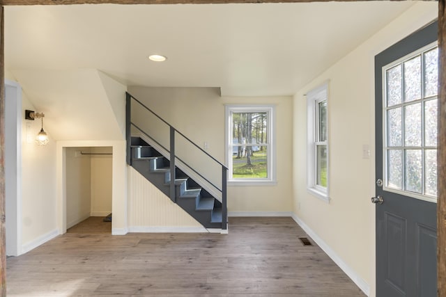 441 Middle Rd, Woolwich, ME 04579 - entrance foyer featuring wood finished floors, baseboards, recessed lighting, and stairs