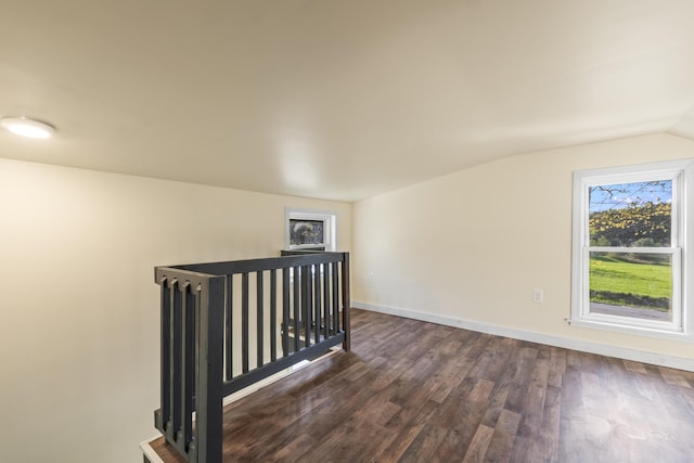 441 Middle Rd, Woolwich, ME 04579 - additional living space with dark wood-type flooring, lofted ceiling, and baseboards