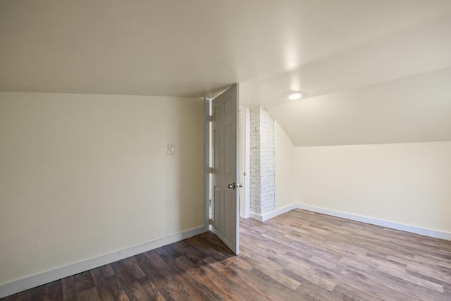 441 Middle Rd, Woolwich, ME 04579 - bonus room featuring dark wood-style flooring, baseboards, and lofted ceiling