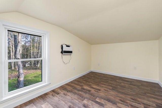 441 Middle Rd, Woolwich, ME 04579 - bonus room featuring vaulted ceiling, dark wood-style floors, baseboards, and heating unit