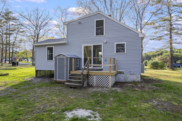 441 Middle Rd, Woolwich, ME 04579 - back of house featuring a wooden deck, a storage shed, a yard, and an outdoor structure