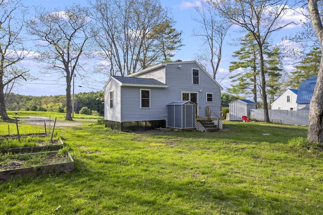 441 Middle Rd, Woolwich, ME 04579 - rear view of property featuring a storage unit, a garden, and an outdoor structure