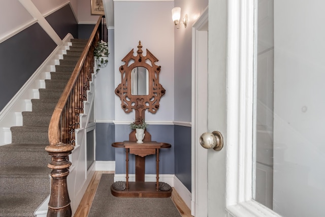 66 Spruce St Unit 1, Portland, ME 04102 - stairs with wood finished floors and baseboards