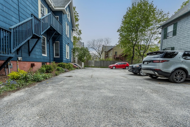 66 Spruce St Unit 1, Portland, ME 04102 - uncovered parking lot featuring a residential view