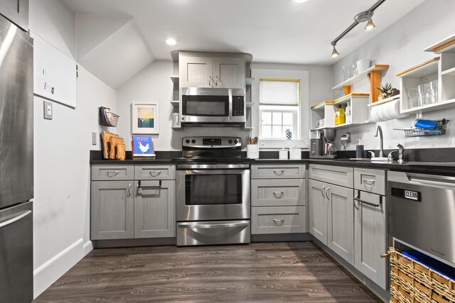 66 Spruce St Unit 1, Portland, ME 04102 - kitchen featuring stainless steel appliances, open shelves, gray cabinetry, dark countertops, and recessed lighting