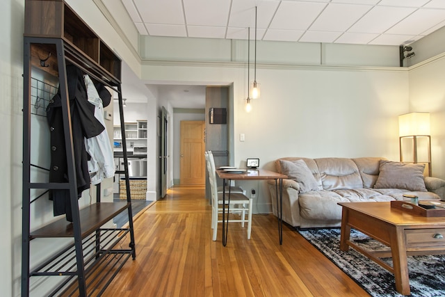 66 Spruce St Unit 1, Portland, ME 04102 - living area with wood finished floors and a paneled ceiling
