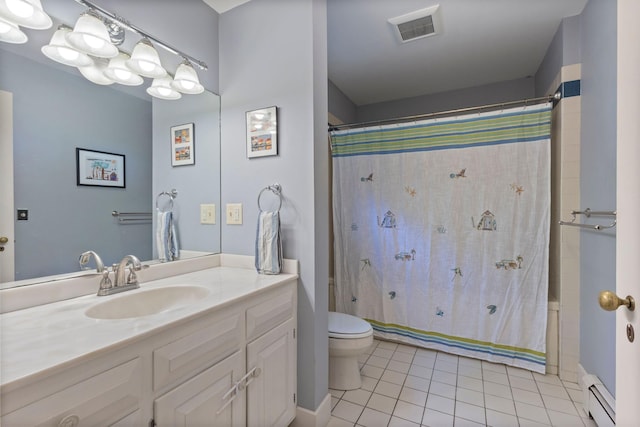 18 Laurel Ln, Eliot, ME 03903 - bathroom with baseboard heating, toilet, tile patterned floors, and vanity