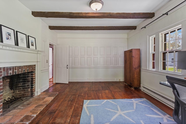 18 Laurel Ln, Eliot, ME 03903 - unfurnished office featuring wood-type flooring, baseboard heating, beamed ceiling, and a fireplace