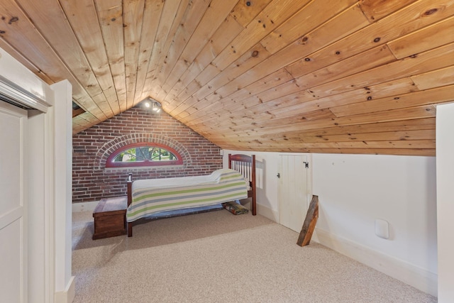 18 Laurel Ln, Eliot, ME 03903 - bedroom featuring brick wall, carpet flooring, wood ceiling, baseboards, and vaulted ceiling