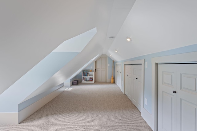 18 Laurel Ln, Eliot, ME 03903 - additional living space with vaulted ceiling, light carpet, and recessed lighting