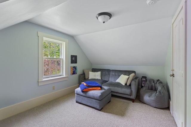 18 Laurel Ln, Eliot, ME 03903 - carpeted living area featuring vaulted ceiling and baseboards