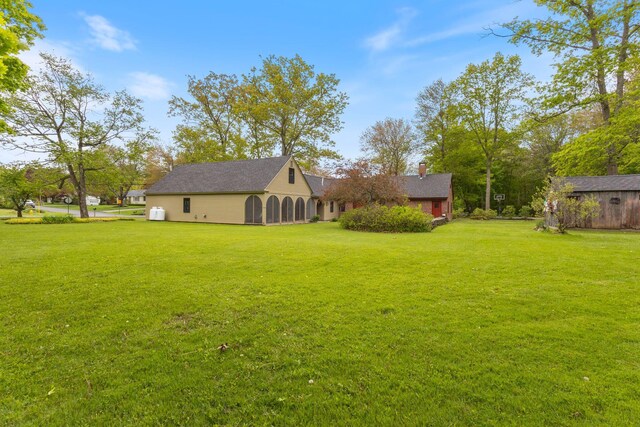 18 Laurel Ln, Eliot, ME 03903 - view of grassy yard featuring an outdoor structure