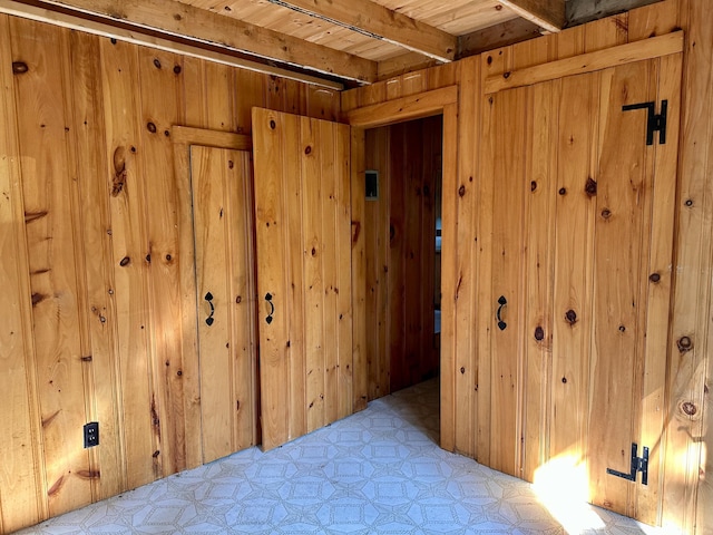 734 Duck Cove Rd, Roque Bluffs, ME 04654 - corridor with light flooring, beamed ceiling, wooden ceiling, and wood walls
