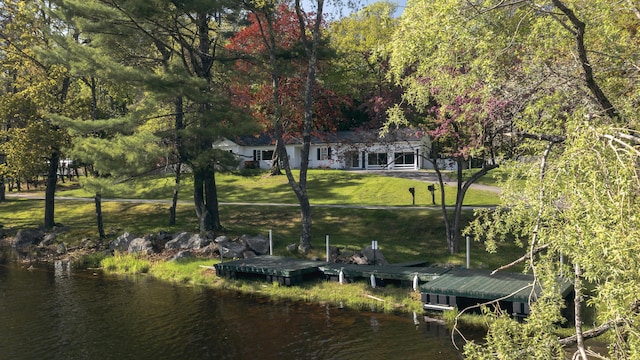 13 Packard Ave, Norway, ME 04268 - dock area with a water view and a lawn