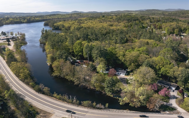 13 Packard Ave, Norway, ME 04268 - aerial overview of property's location featuring a heavily wooded area and a water and mountain view