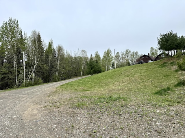 135 W Conroy Lake Rd, Monticello, ME 04760 - view of dirt / gravel road with a barn